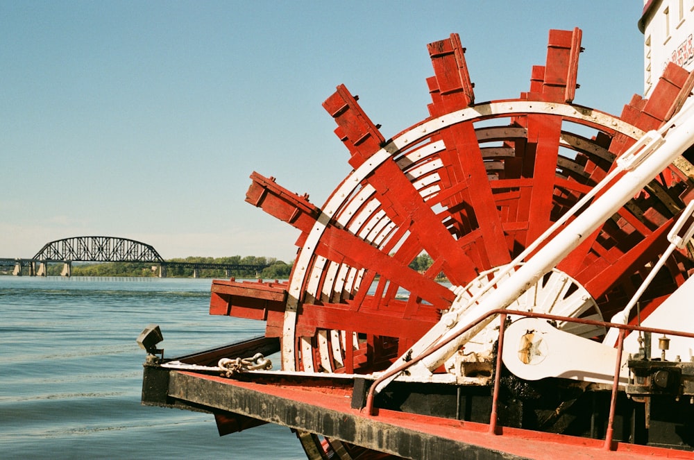 red and white ship on sea during daytime