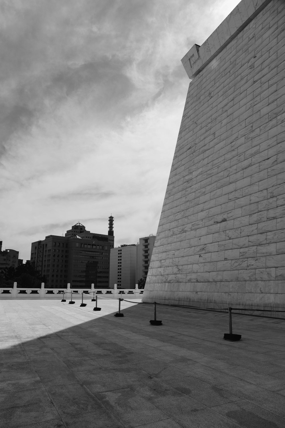 grayscale photo of city buildings