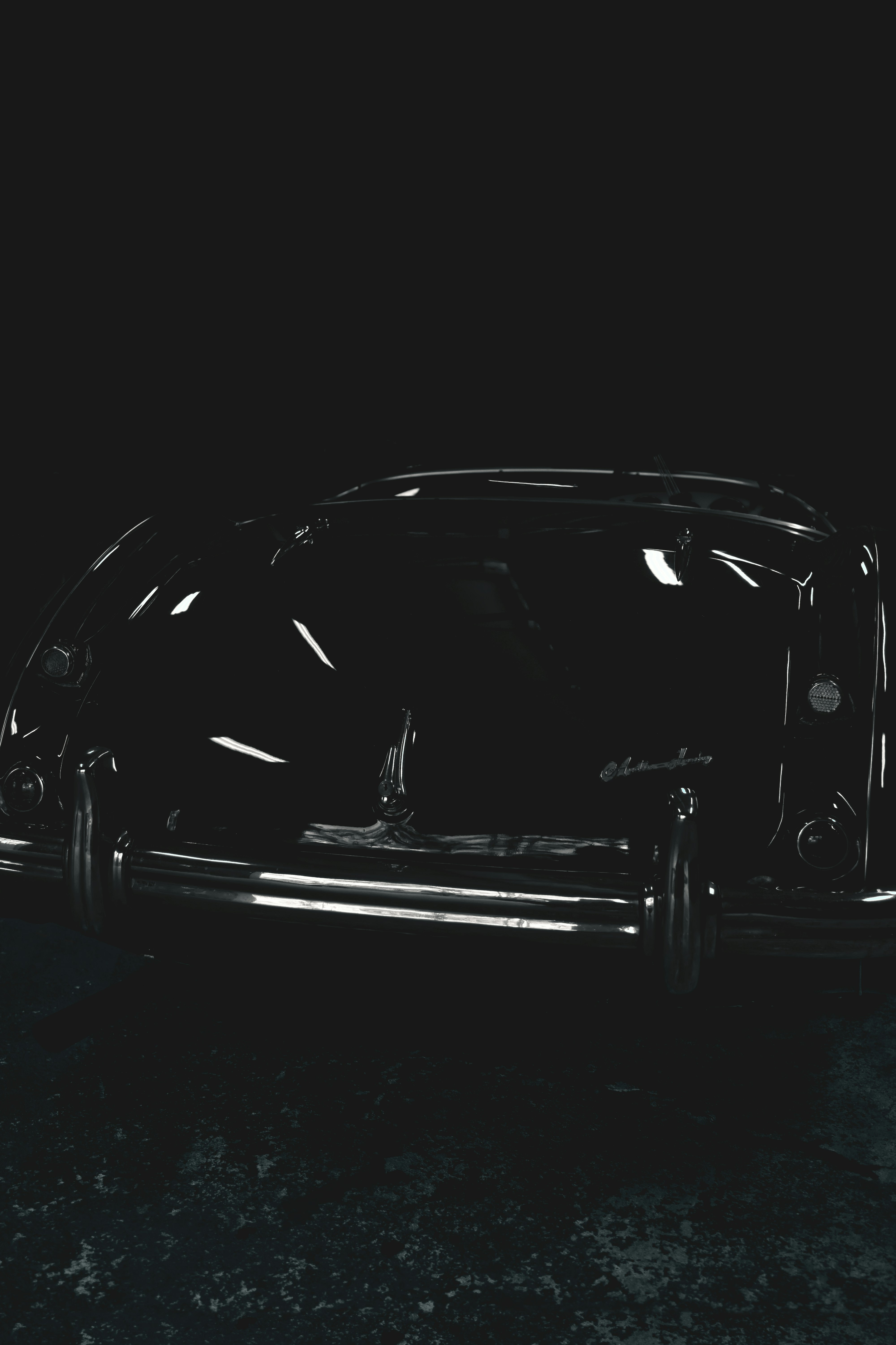 black car on black and white background