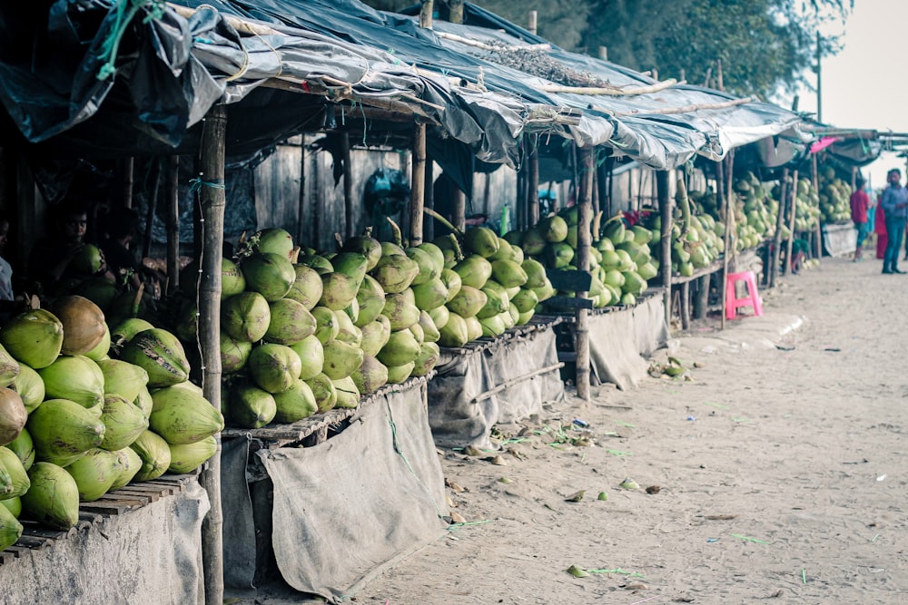 green fruits on gray wooden table