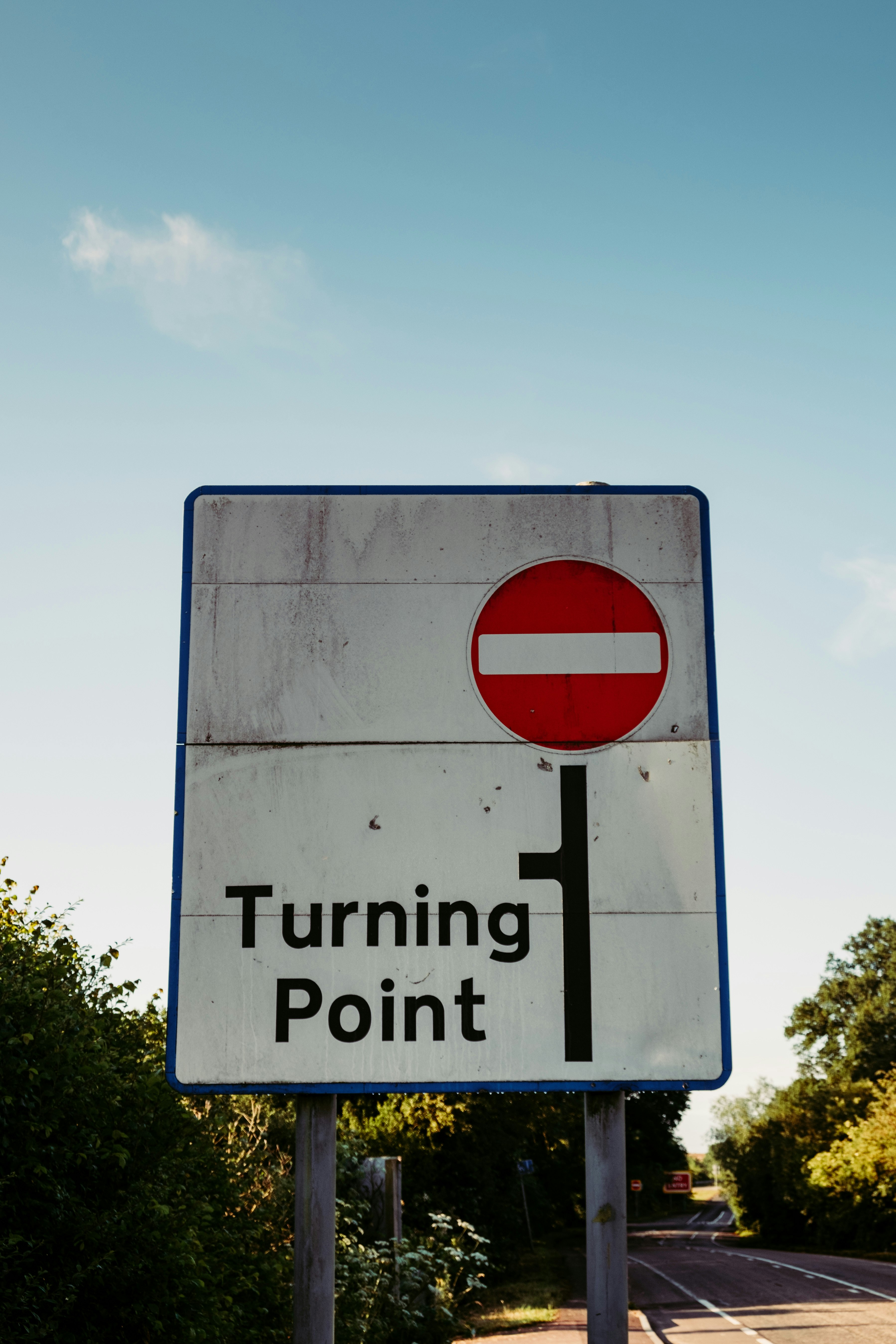 Turning Point and dead end road sign