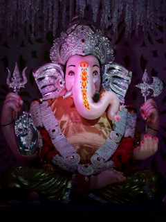 pink and white ceramic figurine