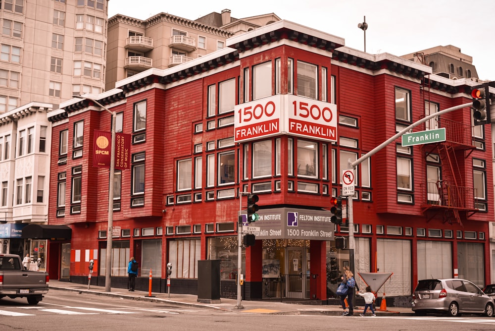 red and white concrete building during daytime