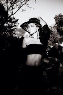 A stylish woman modeling trendy summer clothing outdoors.