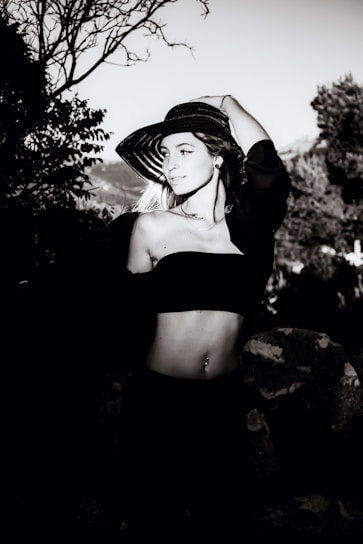 A stylish woman modeling trendy summer clothing outdoors.