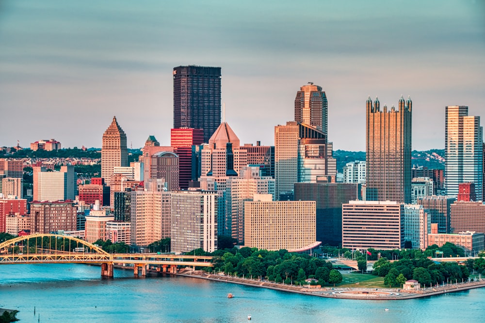 high rise buildings near body of water during daytime