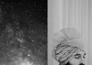 Portrait of Acharya Ravi B Shukla with a cosmic starry background.