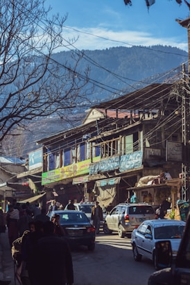 cars parked in front of building during daytime