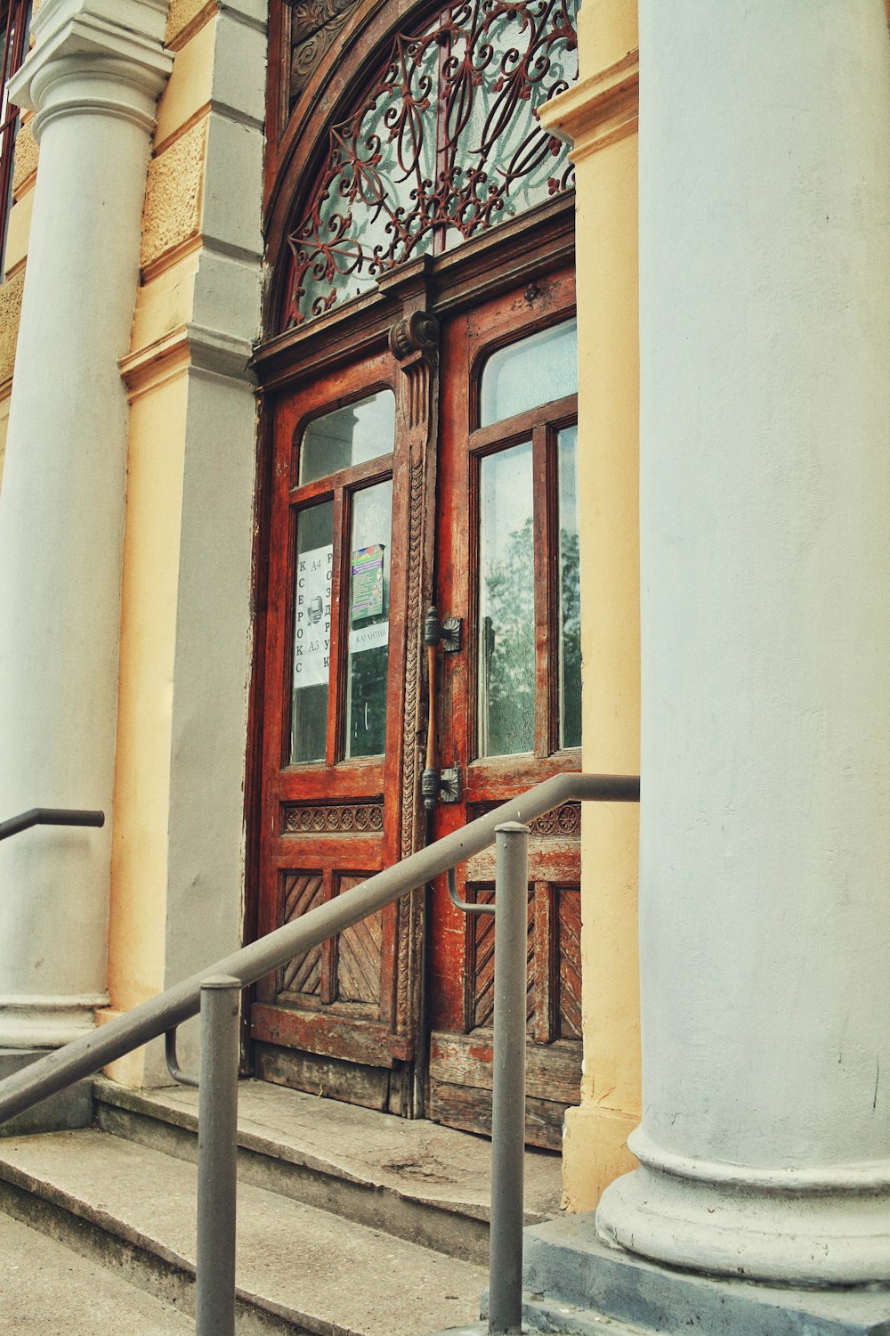 brown wooden framed glass window