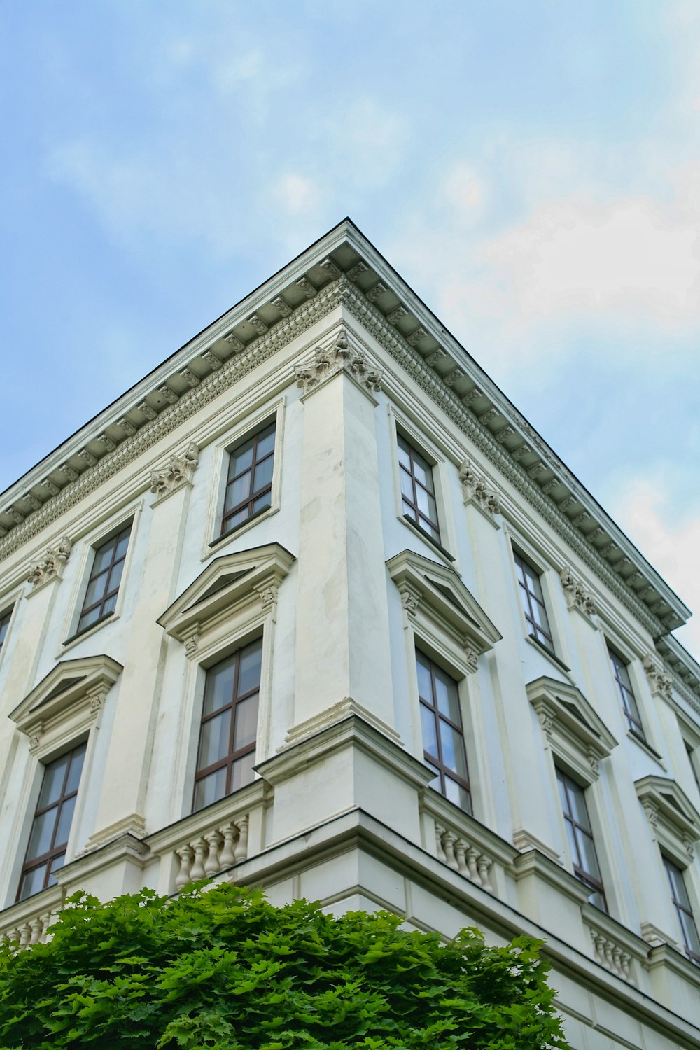 white concrete building under blue sky during daytime