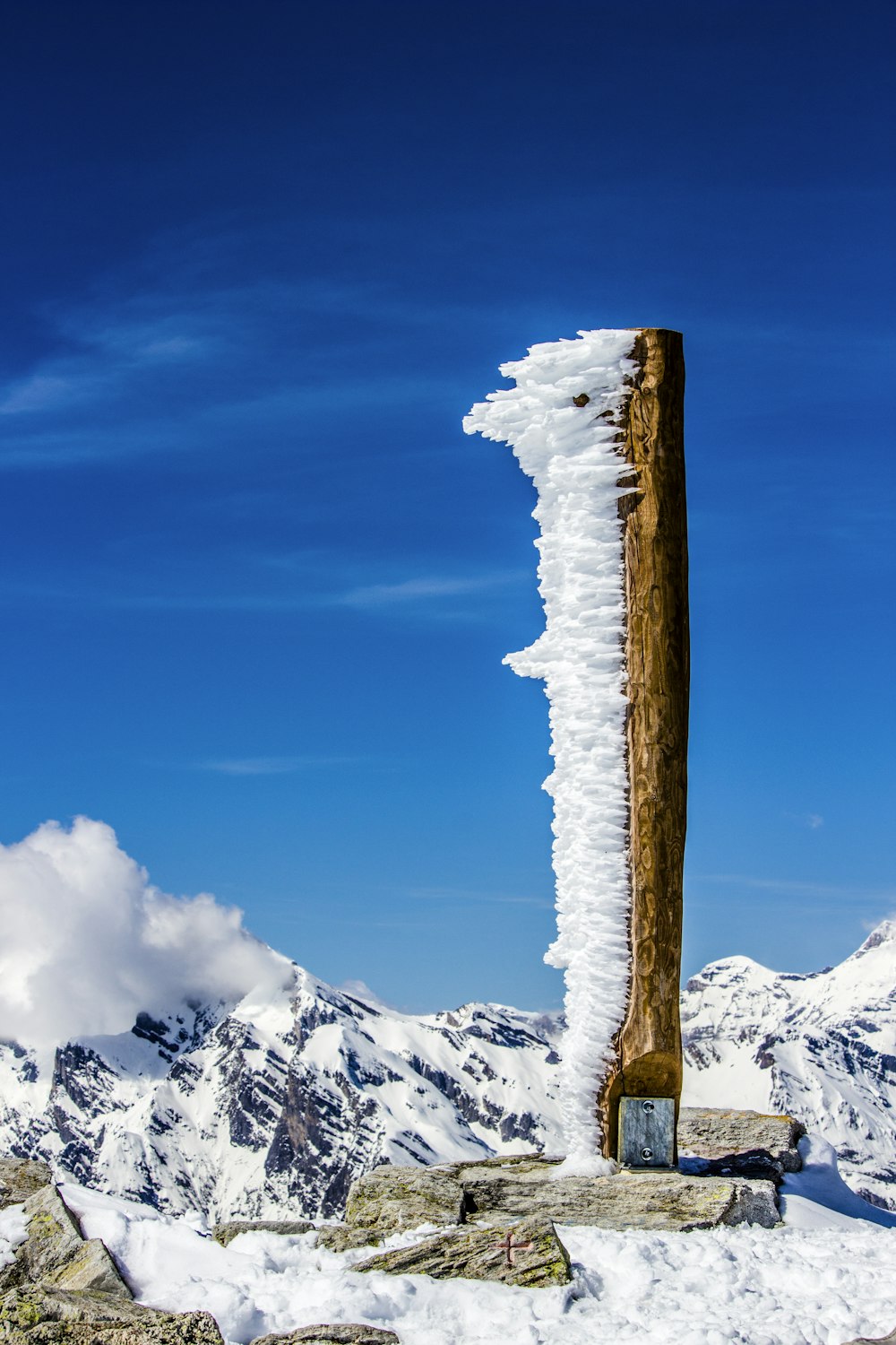 snow covered mountain under blue sky during daytime