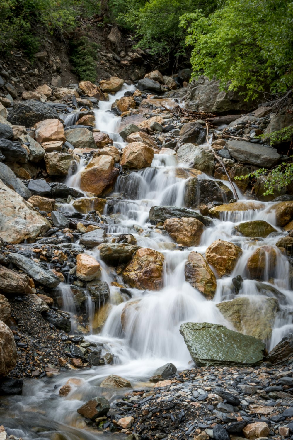 time lapse photography of water falls