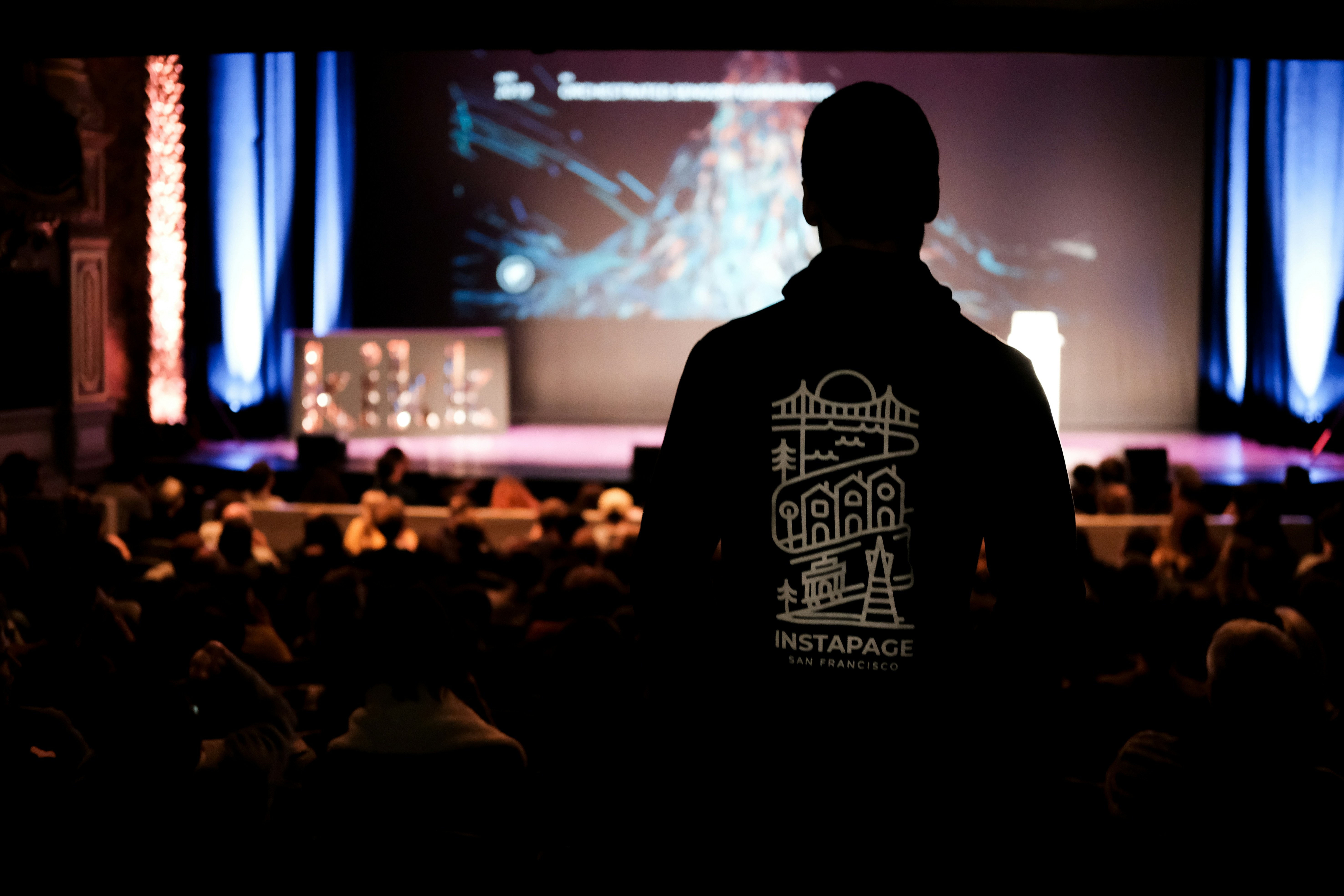 Tim Sweeney speaking on stage at technology conference