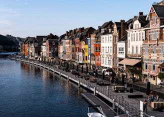 body of water between buildings during daytime