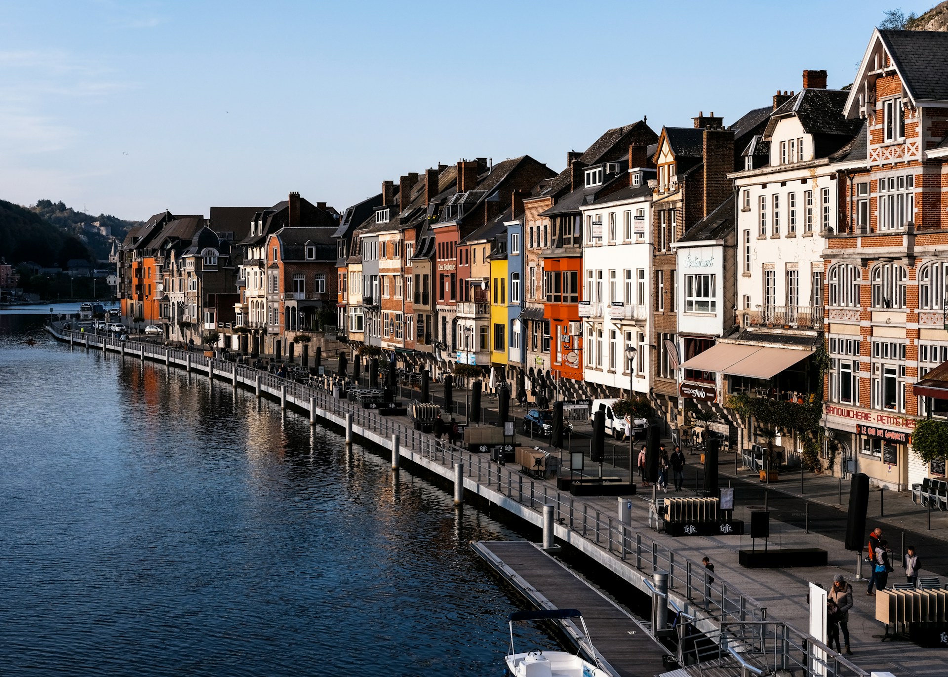 body of water between buildings during daytime