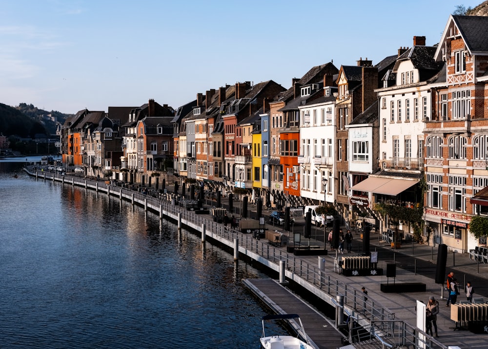 body of water between buildings during daytime