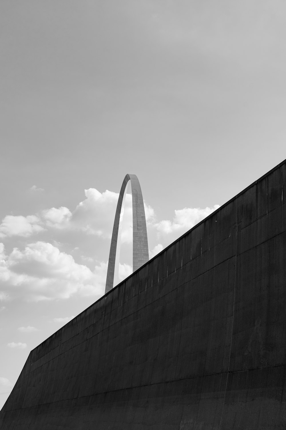 grayscale photo of concrete wall