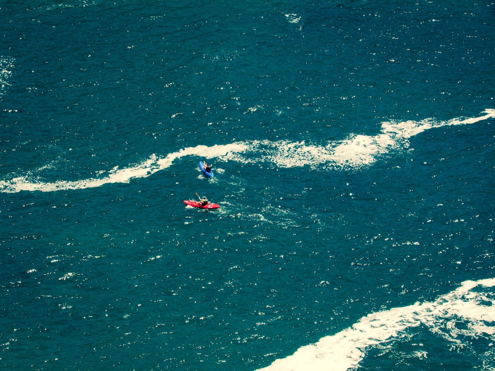 person surfing on ocean waves during daytime