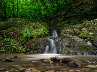 time lapse photography of water falls