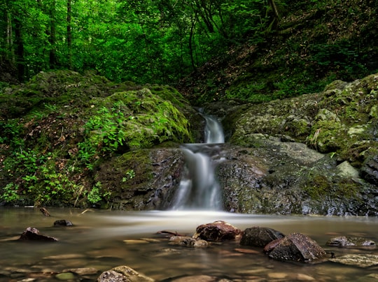 time lapse photography of water falls in Visegrád Hungary