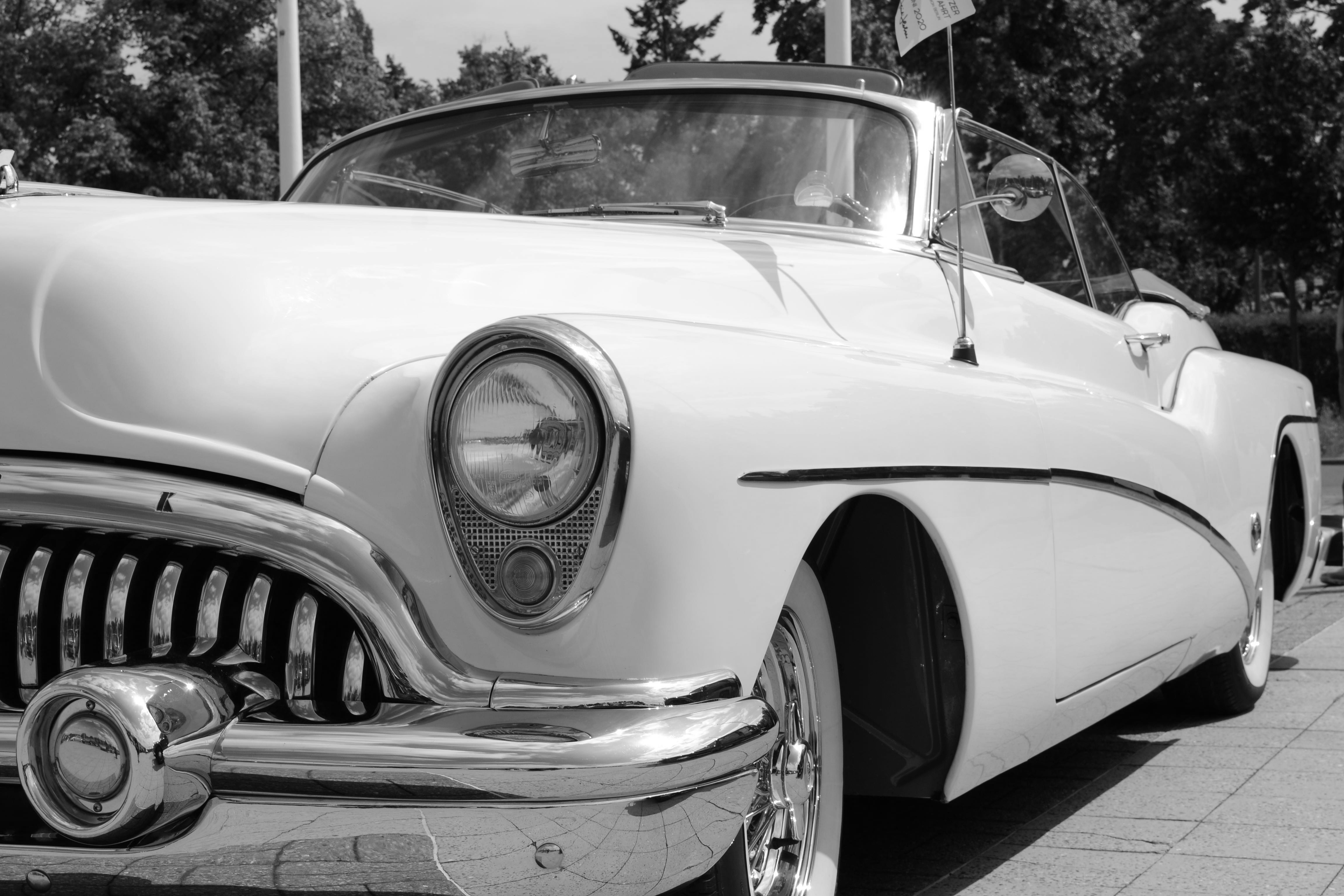 grayscale photo of classic car
