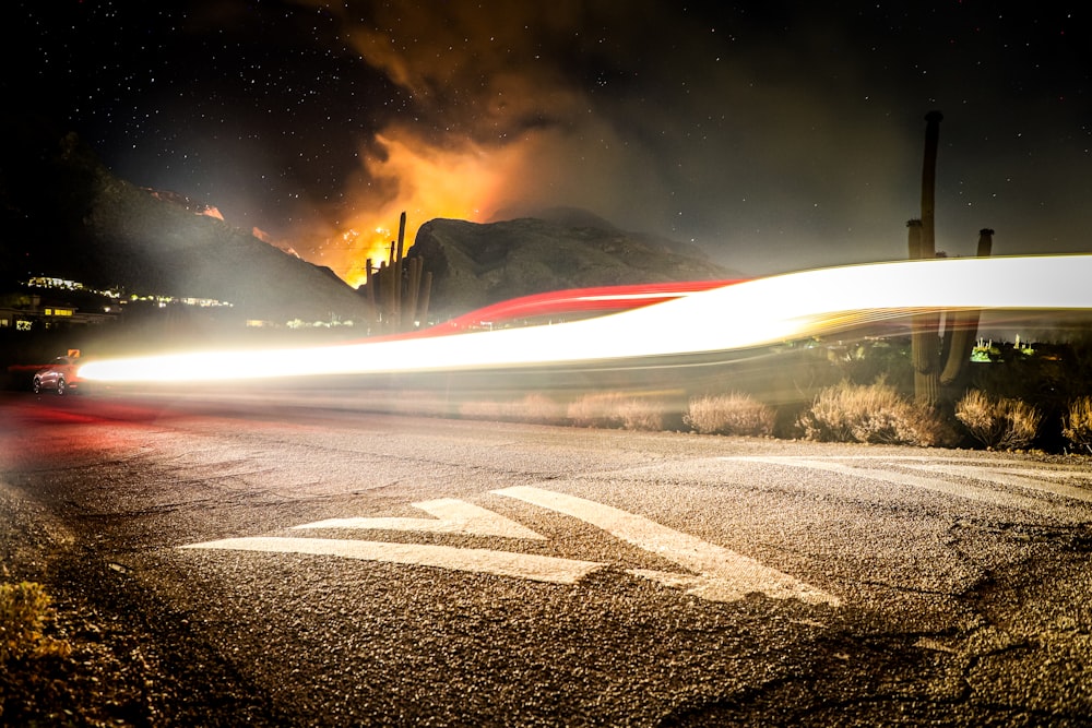 gray asphalt road during night time