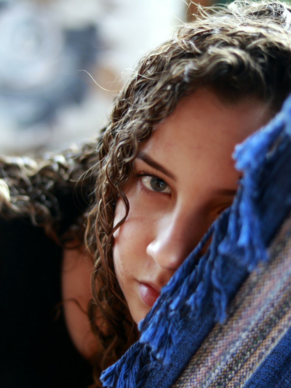 woman in blue scarf on head