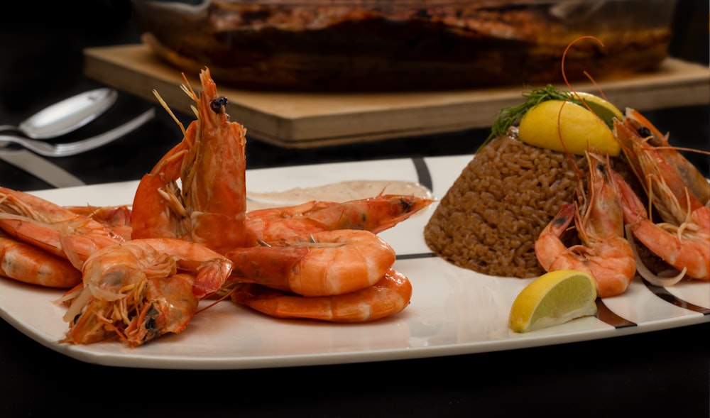 cooked shrimp on white ceramic plate