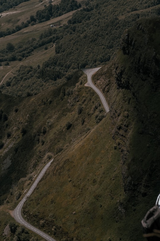 aerial view of green mountains during daytime in Puy Mary France