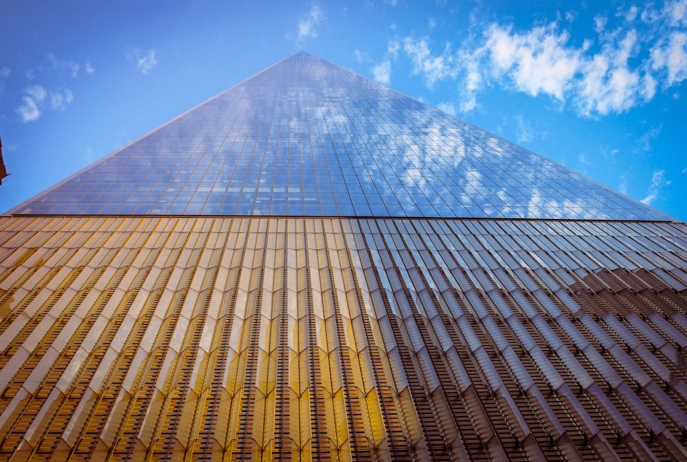 blue and yellow glass pyramid