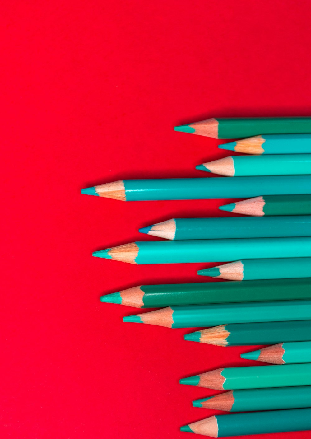 red color pencil on red surface