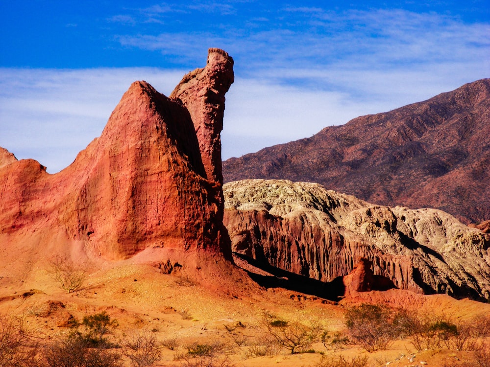 brown rock formation under blue sky during daytime