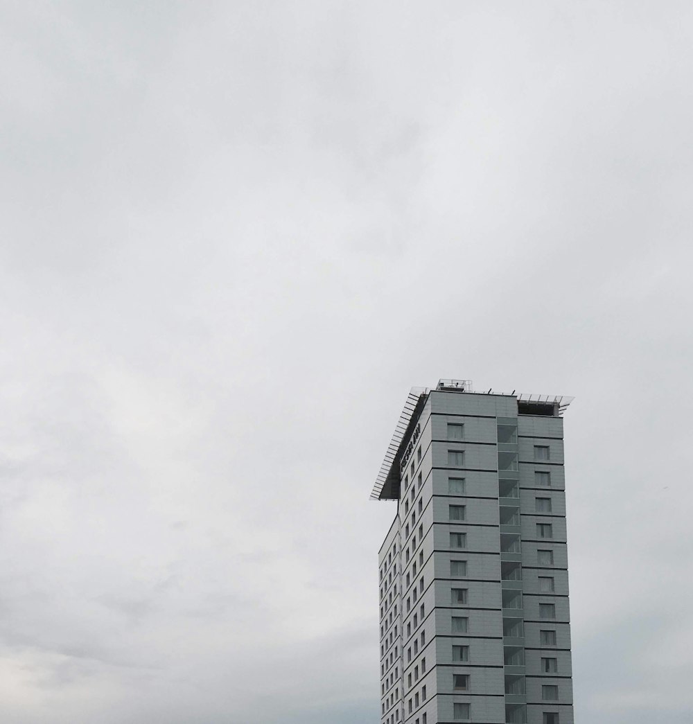 gray concrete building under white sky during daytime