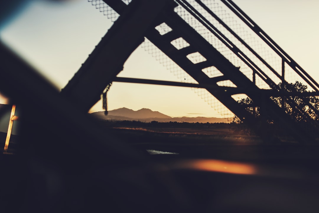 silhouette of bridge during sunset