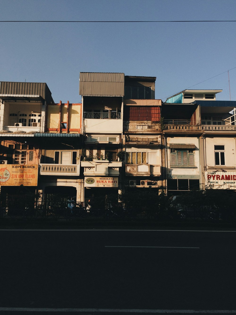 brown and white concrete building during daytime