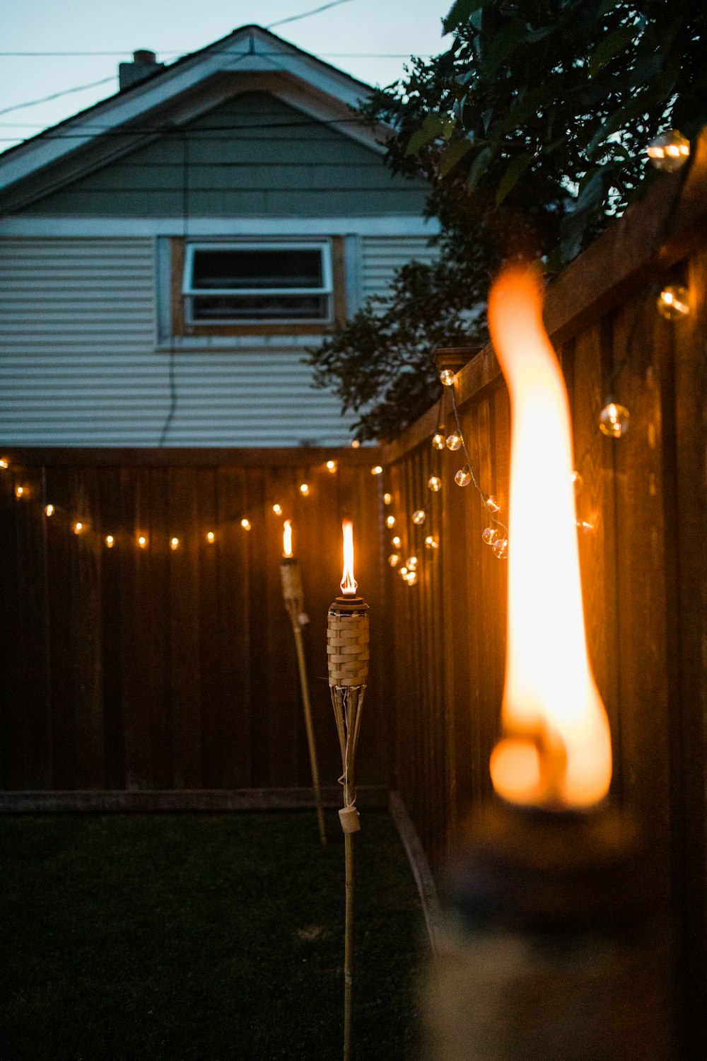 lighted candles on street during night time