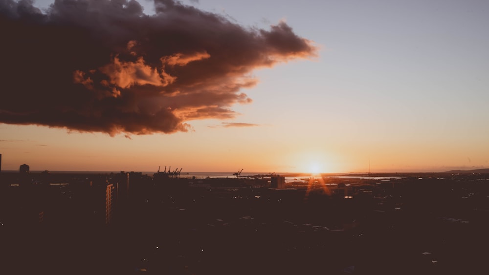 silhouette of buildings during sunset