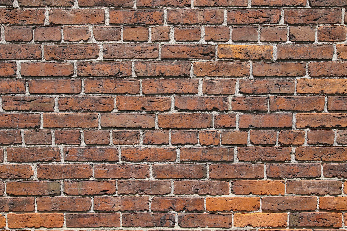 Clean well-maintained brick wall after repointing