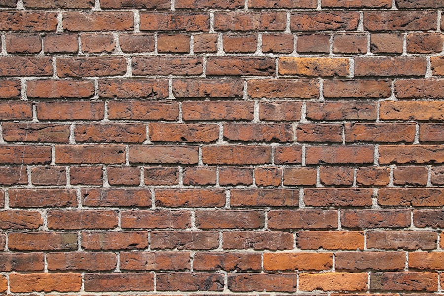 Freshly tuckpointed red brick wall with defined white mortar joints