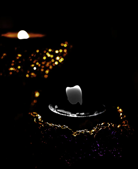 A sleek black background with the animated šešėlis logo glowing faintly in gold.