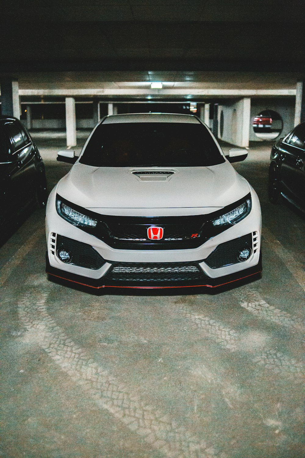 white bmw m 3 parked on parking lot