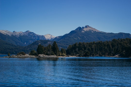 green trees near body of water during daytime in San Carlos de Bariloche Argentina