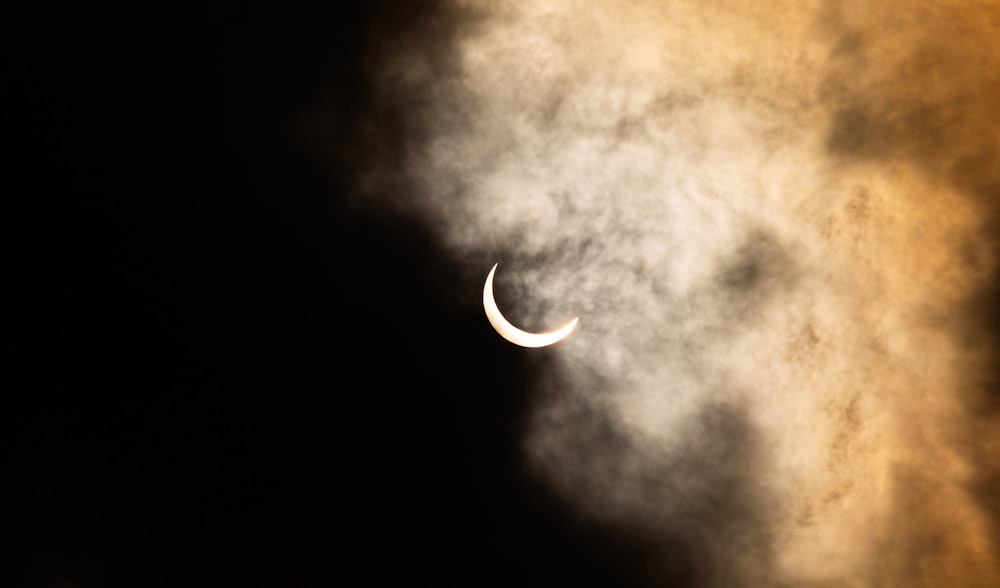 grayscale photo of crescent moon