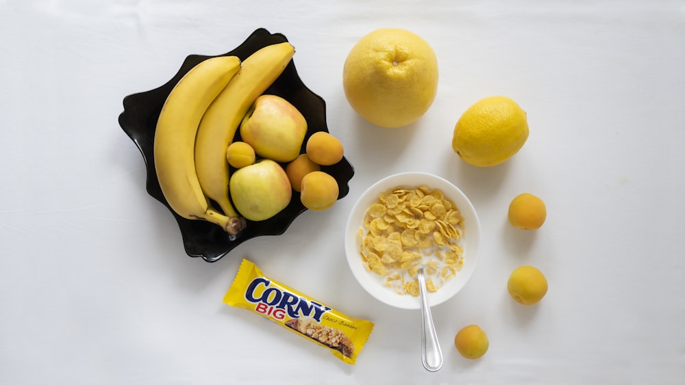 white ceramic bowl with yellow lemon fruits