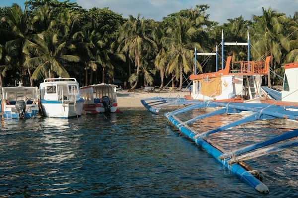 White and blue boat on body of water during daytime — Boracay, Philippines
