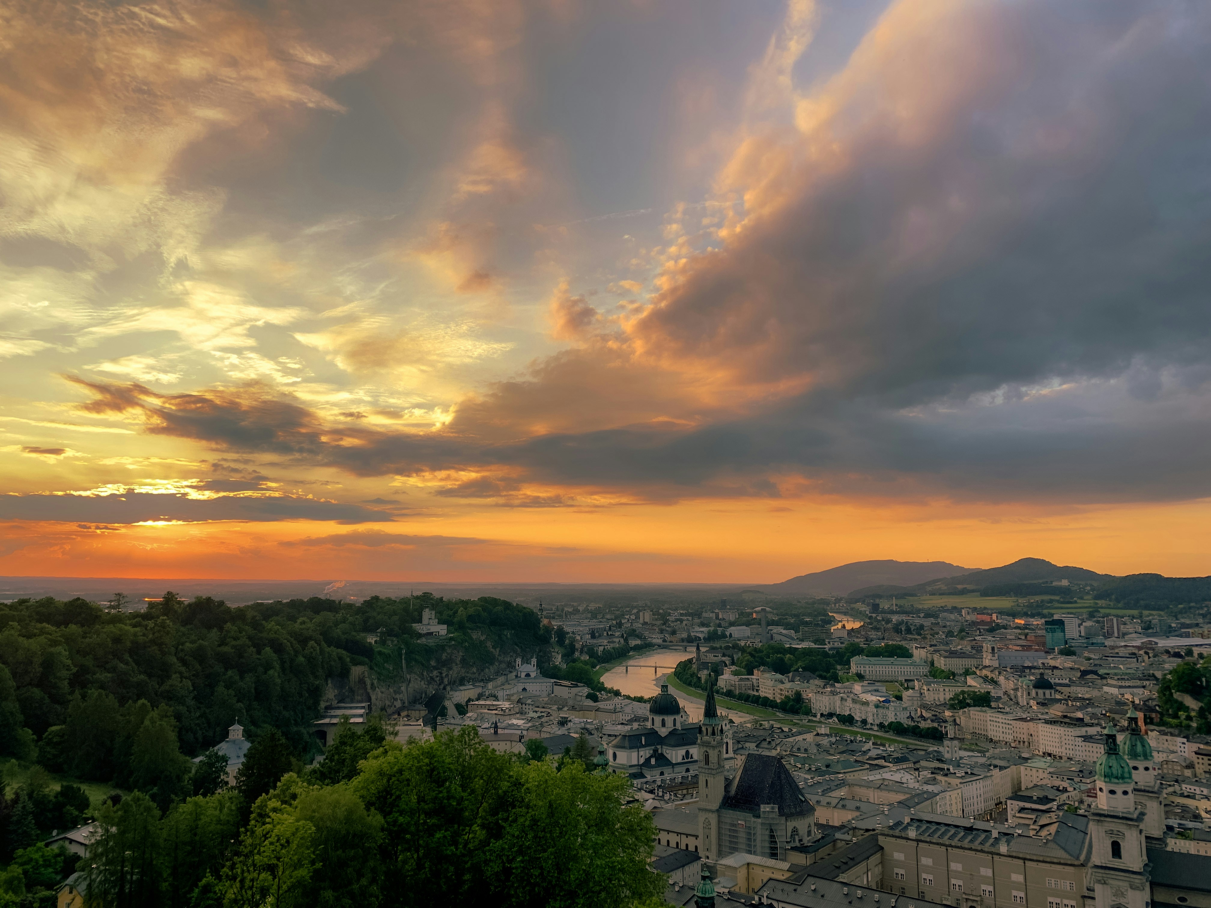 Salzburg at sunset with the fortress above the Salzach