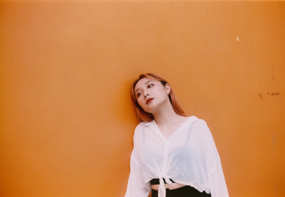 woman in white long sleeve shirt