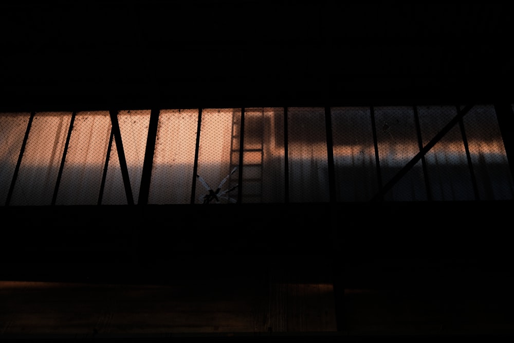 black metal frame on brown wooden floor