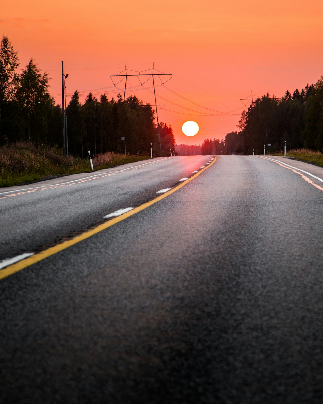 gray asphalt road during sunset