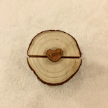 Close-up of a custom engraved wooden photo frame with a heartfelt message